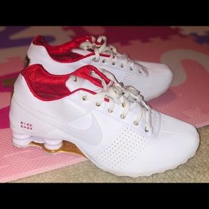Woman’s white/ red/ gold leather Nike shox 8.5